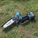 Makita UC029GZ, Motosierra azul/Negro